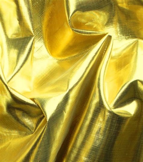 shiny gold metallic fabric|metallic gold cotton quilting fabric.